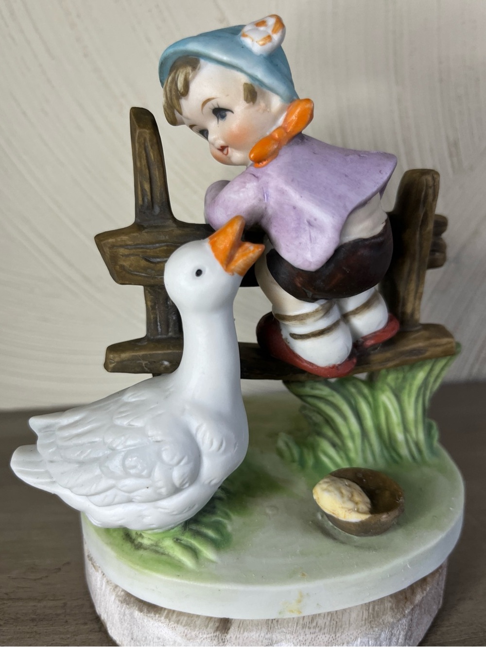 Porcelain Boy and Goose Figurine in White, Lavender, Blue